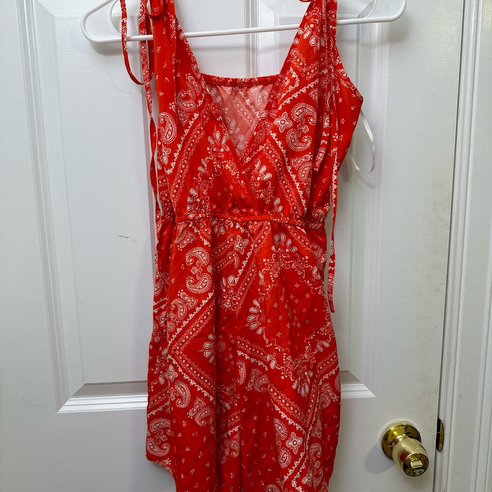 Small Red bandana print romper with adjustable straps and pockets